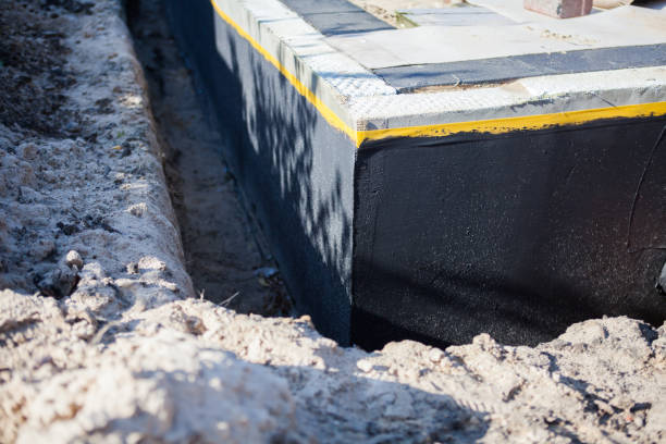 Professional Waterproofing technician working in Russellville, KY